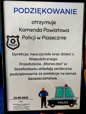 podziękowanie, które otrzymali policjanci od dyrekcji oraz przedszkolaków