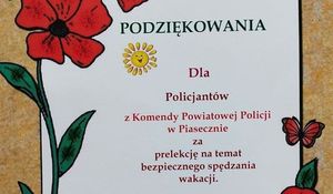 Kolorowy dyplom na którym jest podziękowanie od organizatorów i uczestników akcji &quot;Lato w mieście&quot; dla Policjantów z Komendy Powiatowej Policji w Piasecznie za przeprowadzone spotkanie profilaktyczne.